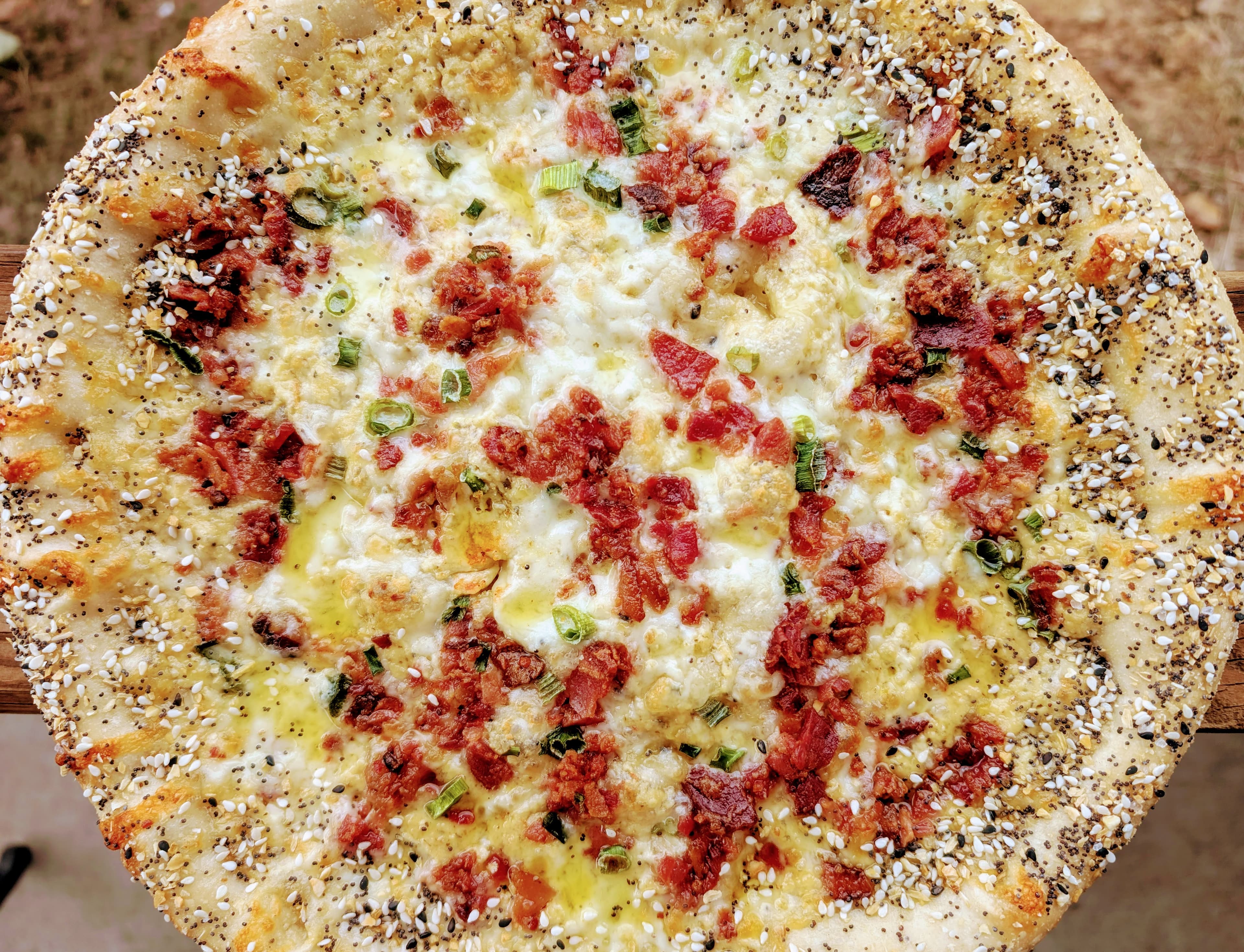 A brick-oven artisan pizza fresh out of the oven at Snowpack Pizzeria in Conifer, Colorado